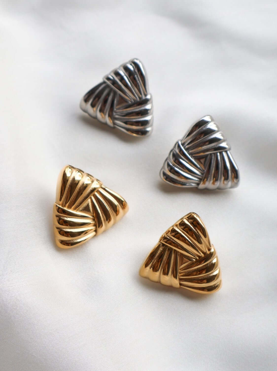 Close up Alexa Triangle Earrings in Gold and Silver