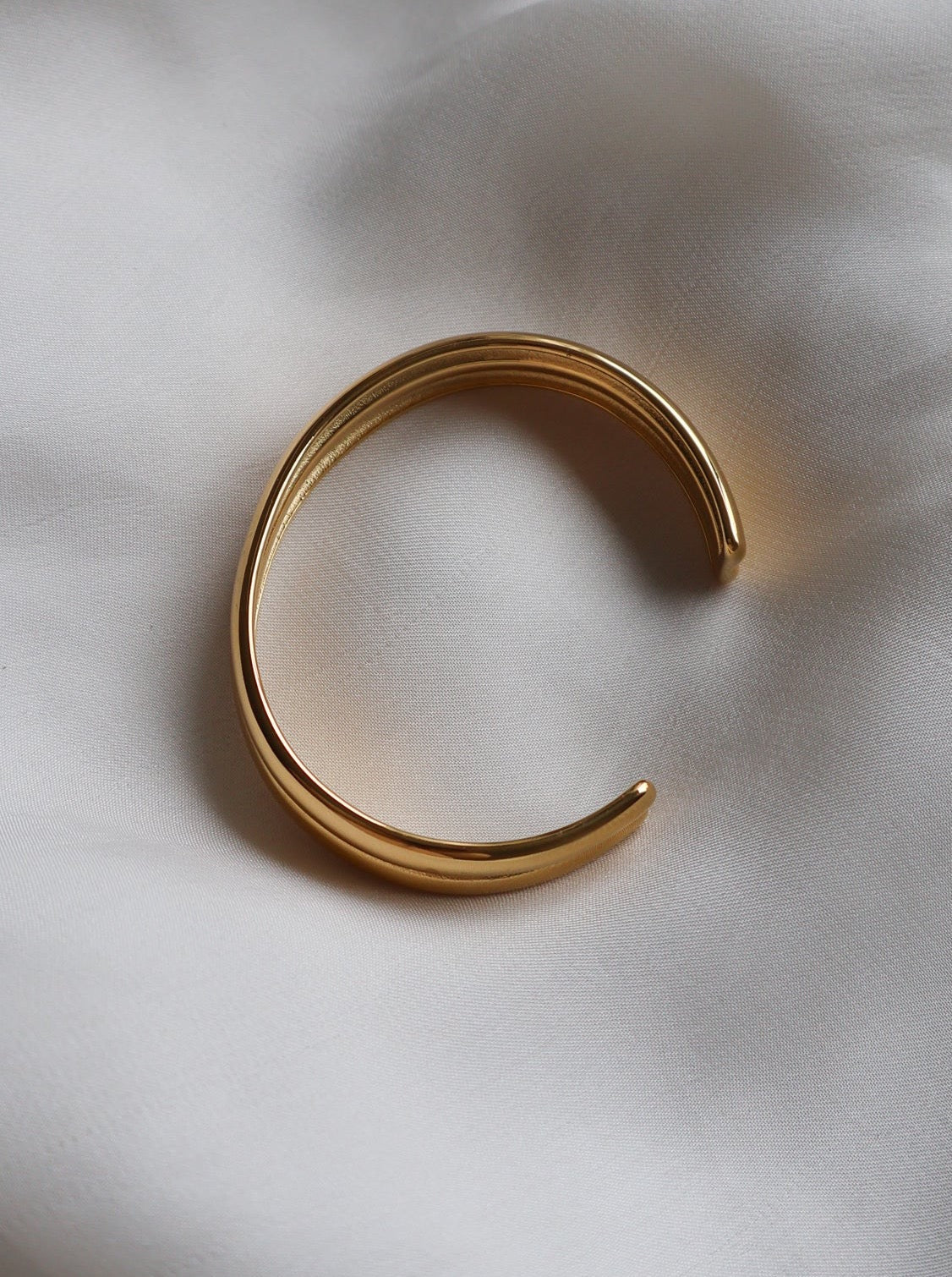 Side angle of Haidi Gold Cuff Bangle