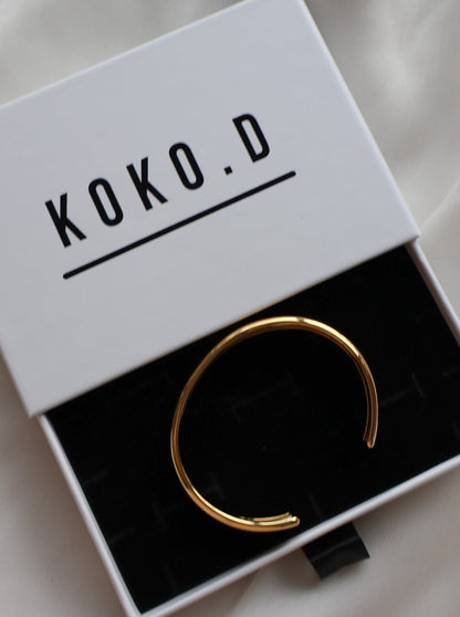 Haidi Gold Cuff Bangle in KOKO.D jewellery box